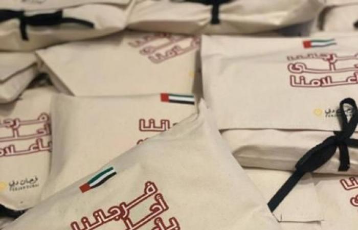 «فرجان دبي» توزع 500 علم